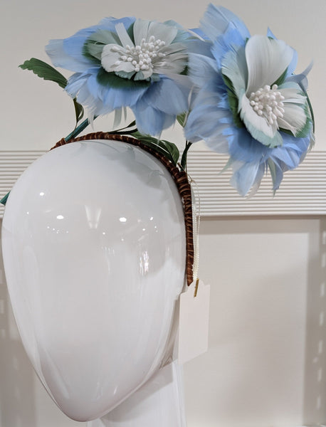 Melanie Ferrero - White Headband with Blue Feather Flowers